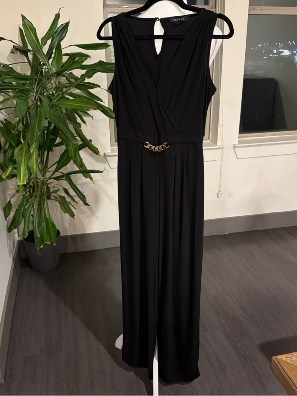 Black Sleeveless Jumpsuit with Gold Chain Detail